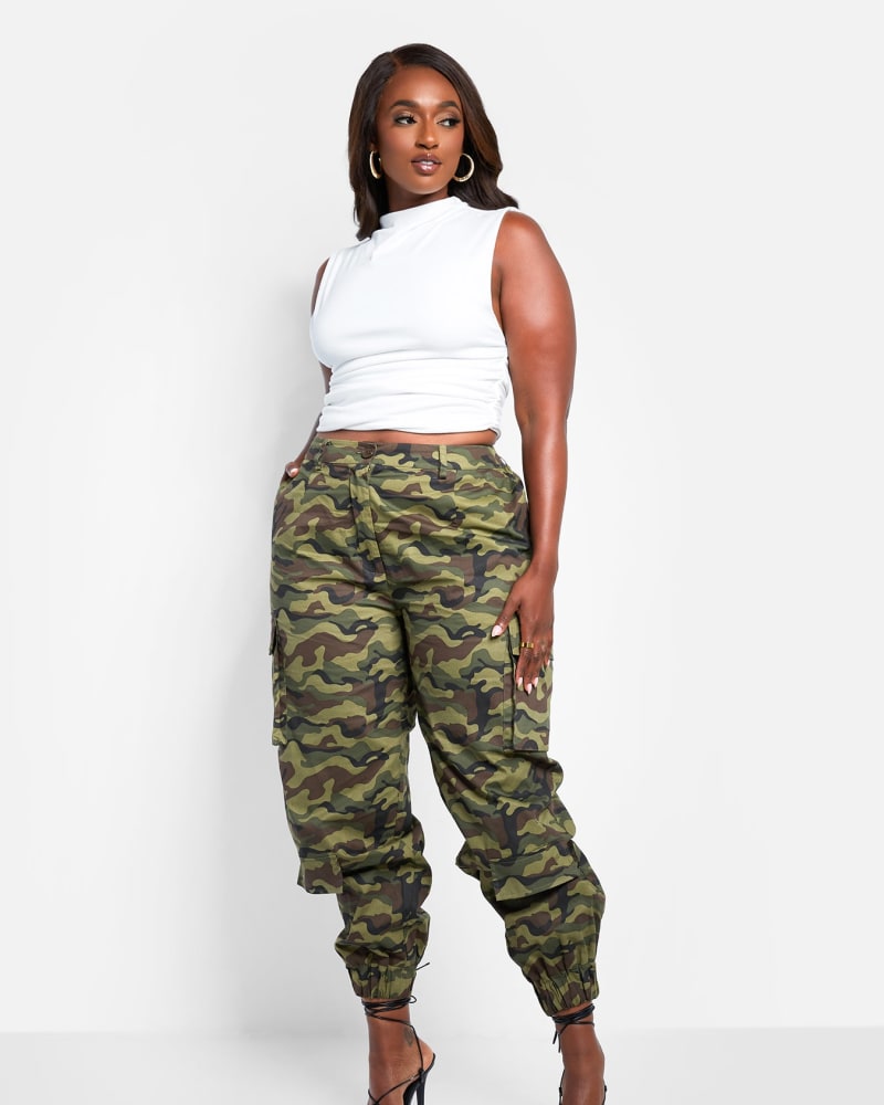 Front of a model wearing a size L Rule Breaker Camo Print Cargo Pants in Green by Rebdolls. | dia_product_style_image_id:321182